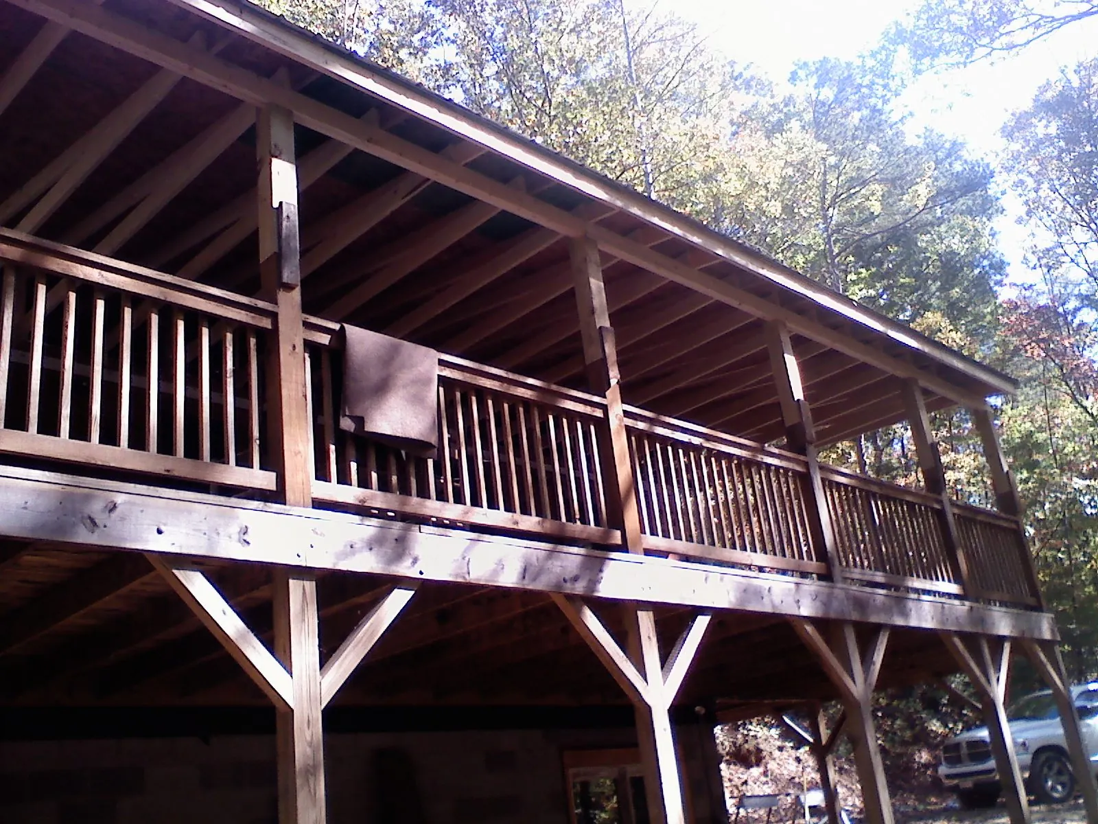 Timber framing under a new elevated porch and deck — Roof Leak Repair in Worden by Roofing Brothers